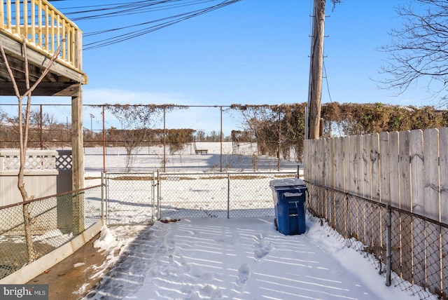 view of yard covered in snow