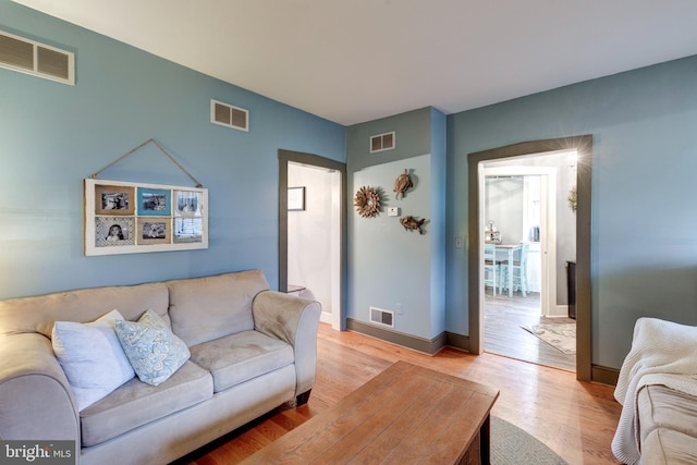 living room featuring light wood-type flooring