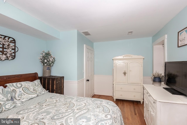 bedroom featuring light wood-type flooring