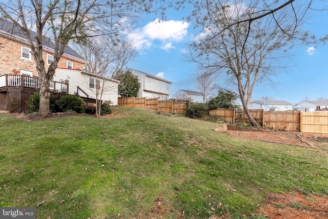 view of yard featuring a wooden deck