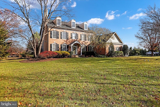 view of front of home with a front yard