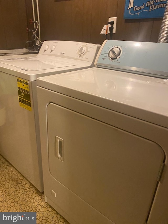 washroom featuring washer and dryer