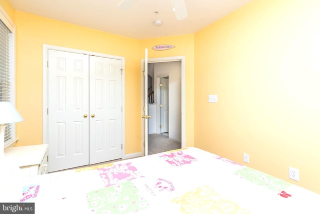 bedroom featuring a closet and ceiling fan