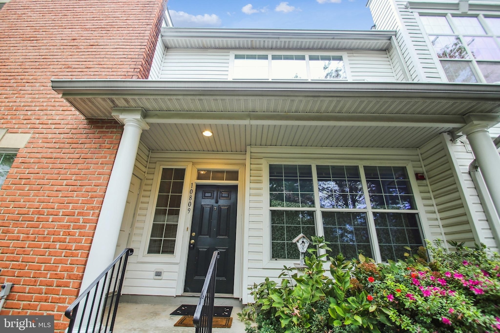 entrance to property with covered porch