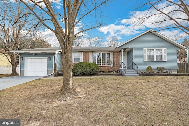 ranch-style home with a garage and a front lawn