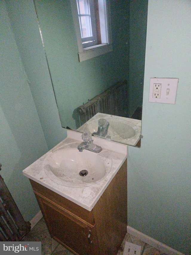 bathroom with vanity and tile patterned floors