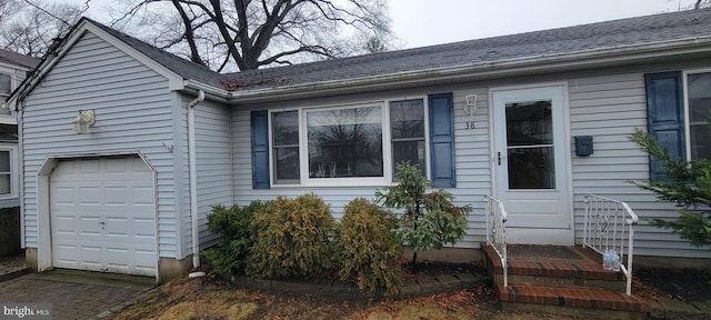 exterior space with a garage