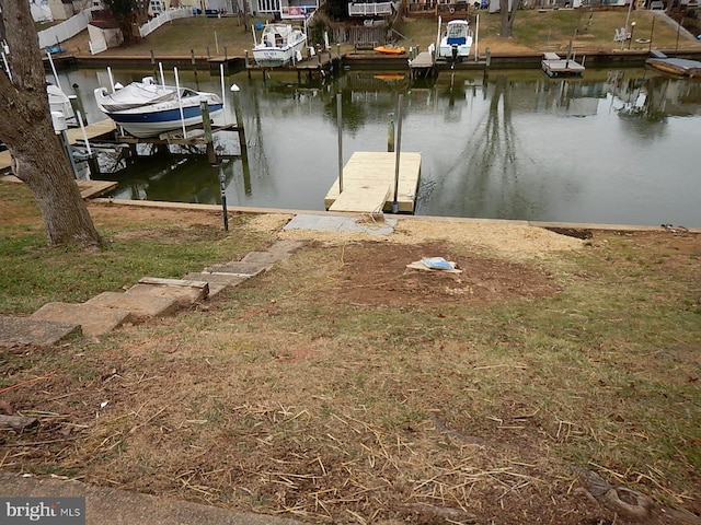 dock area featuring a water view