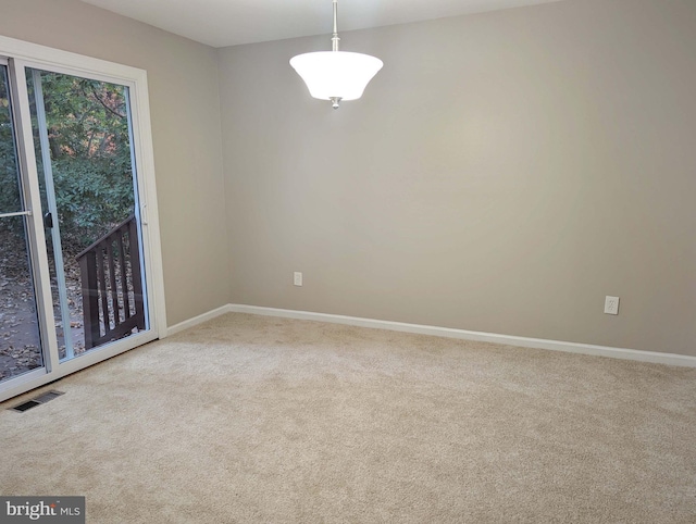 view of carpeted spare room