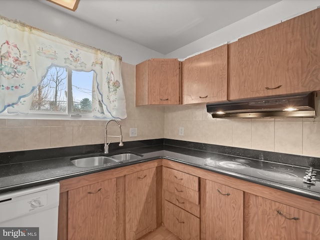 kitchen with exhaust hood, white dishwasher, black electric cooktop, sink, and backsplash