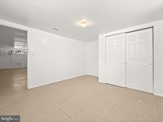 unfurnished bedroom featuring a closet