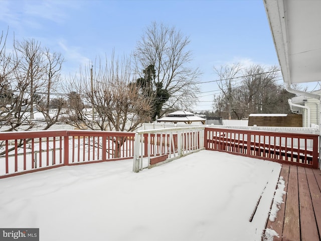 view of snow covered deck