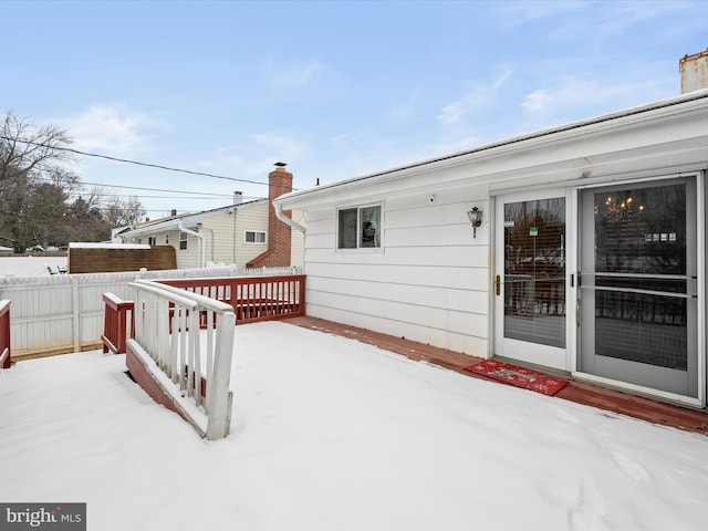 view of snow covered deck