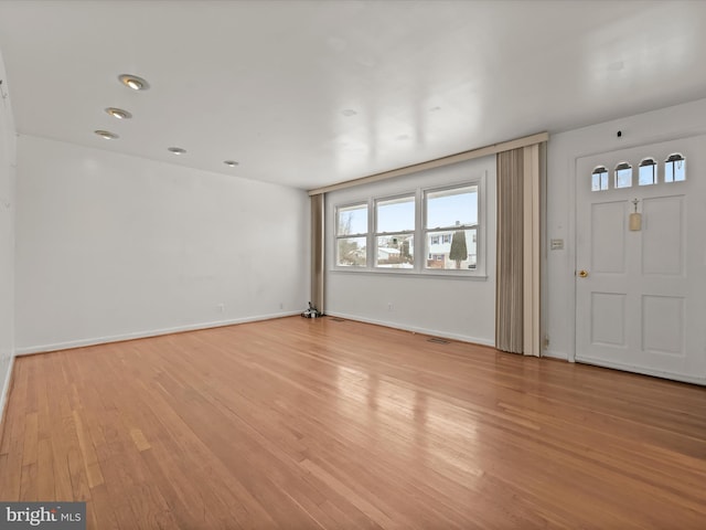 entrance foyer featuring light hardwood / wood-style floors