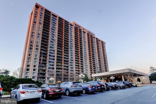 view of outdoor building at dusk