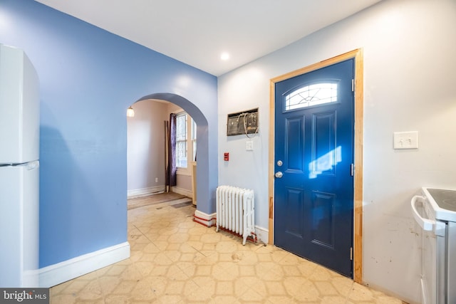 entrance foyer with radiator heating unit