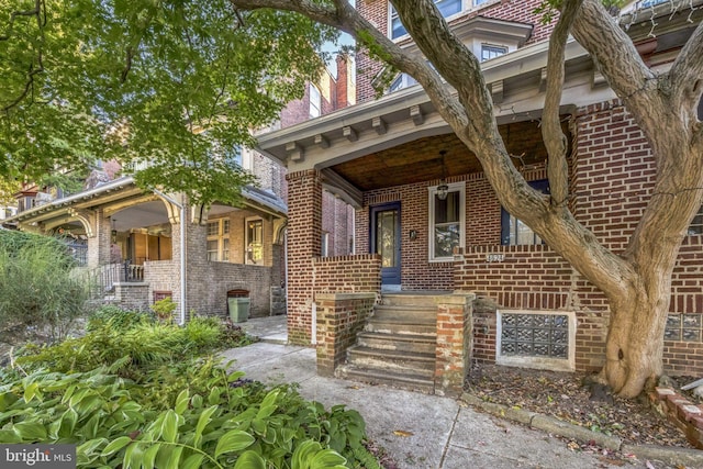 entrance to property with covered porch