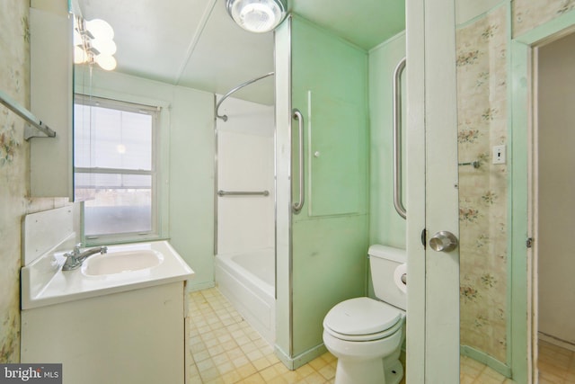 full bathroom with vanity, washtub / shower combination, and toilet