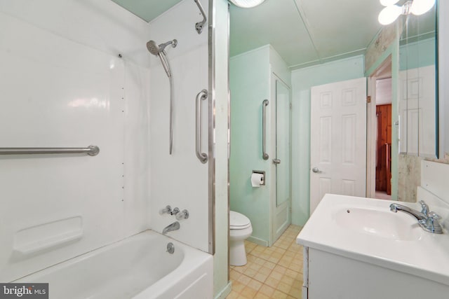 full bathroom featuring vanity, toilet, and  shower combination