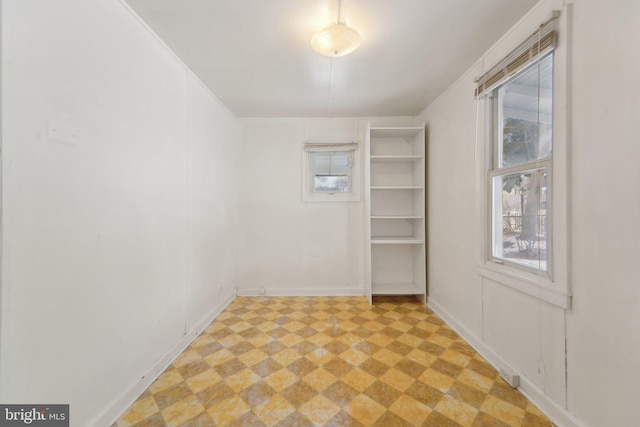 spare room with plenty of natural light