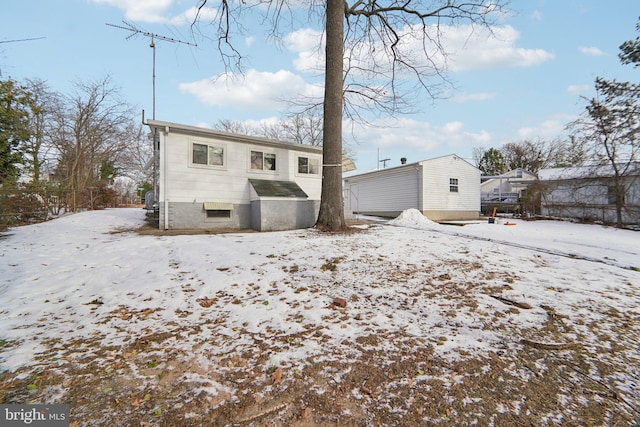 view of snow covered house