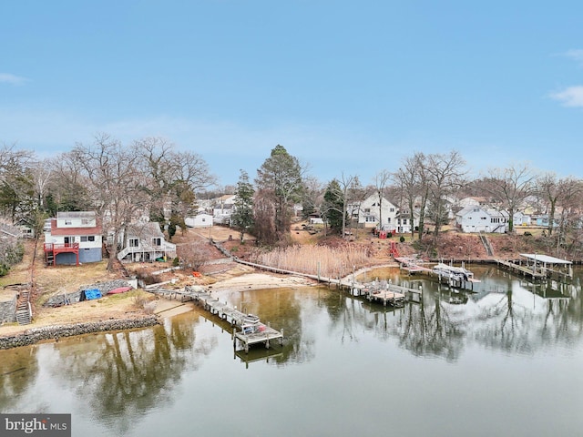 dock area with a water view