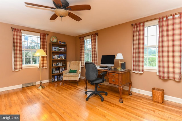 office area featuring ceiling fan and light wood-type flooring