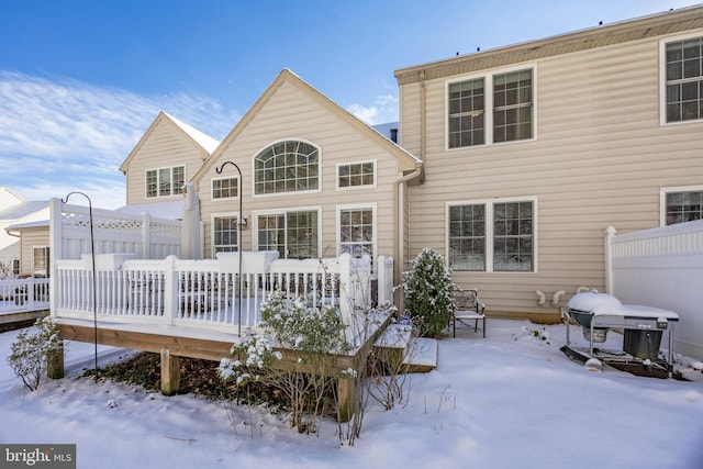 view of snow covered property