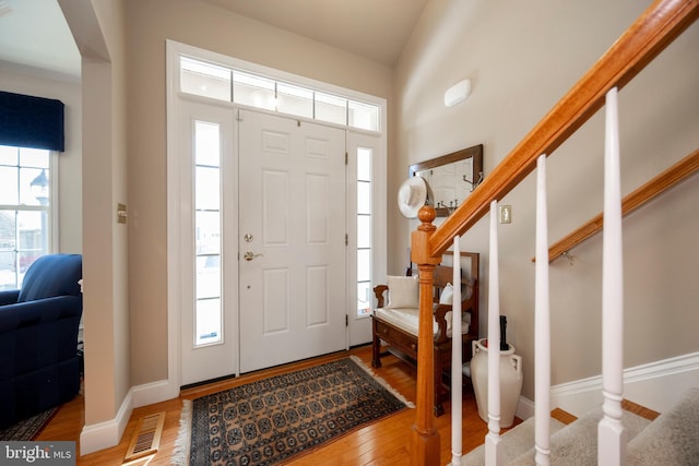 foyer entrance featuring wood-type flooring