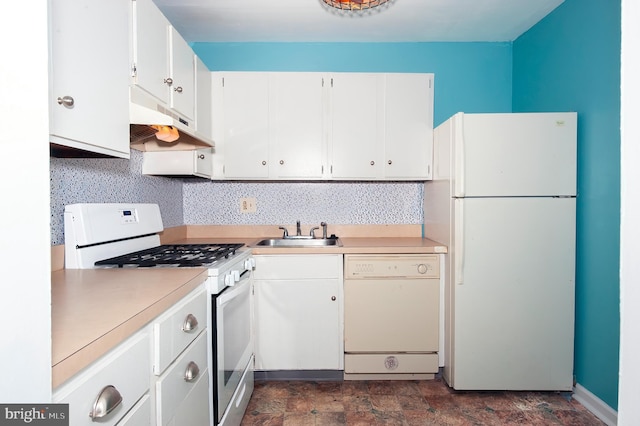 kitchen with white cabinets, decorative backsplash, white appliances, and sink