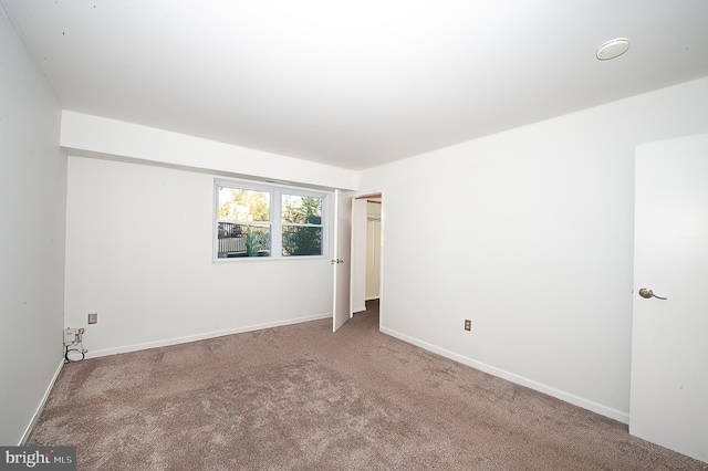 view of carpeted spare room