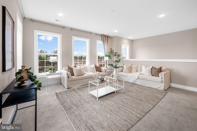 living room with light colored carpet