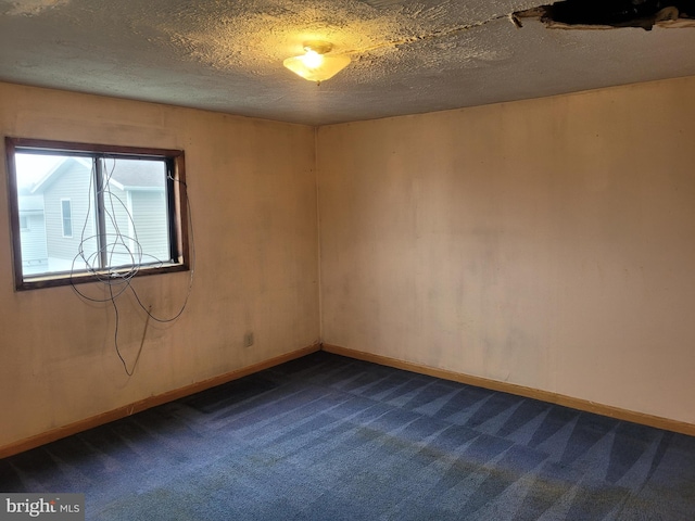 11 Green St, Frostburg, MD 21532 - carpeted spare room featuring a textured ceiling