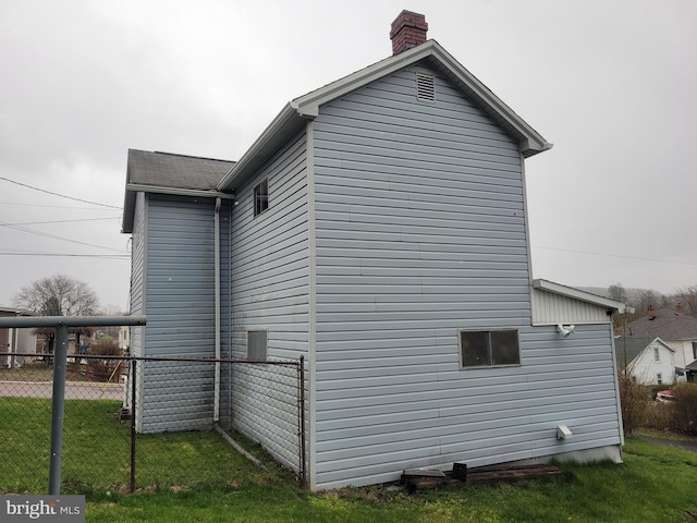 11 Green St, Frostburg, MD 21532 - view of home's exterior featuring a lawn