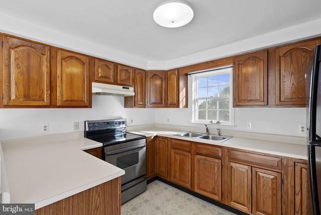 kitchen featuring stainless steel appliances and sink