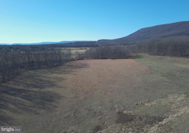 property view of mountains with a rural view