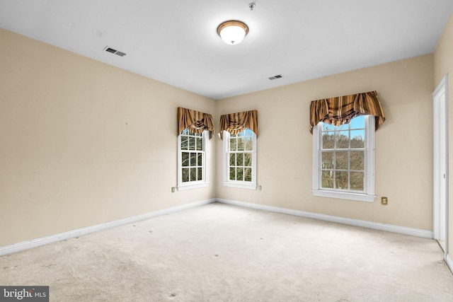 view of carpeted spare room