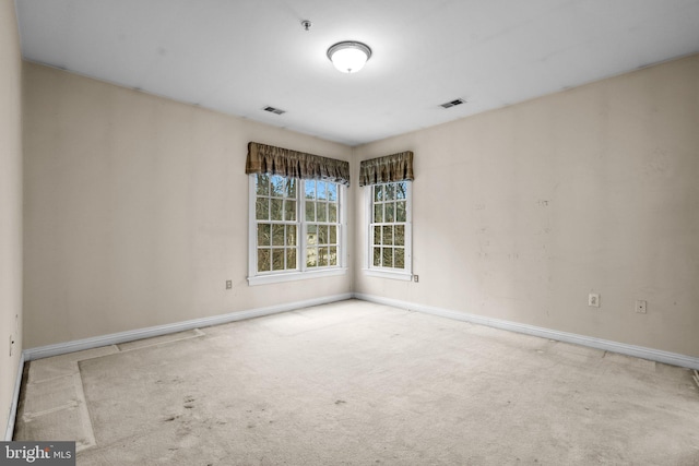 empty room with carpet floors