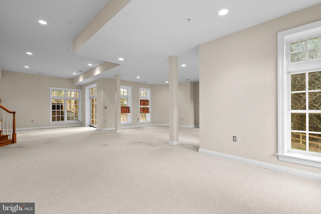 basement with light colored carpet