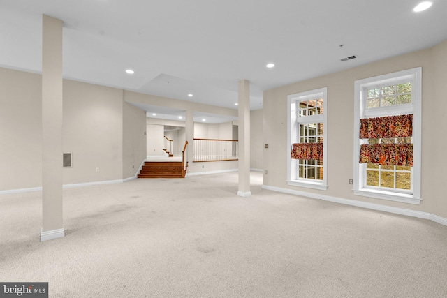 basement with light carpet