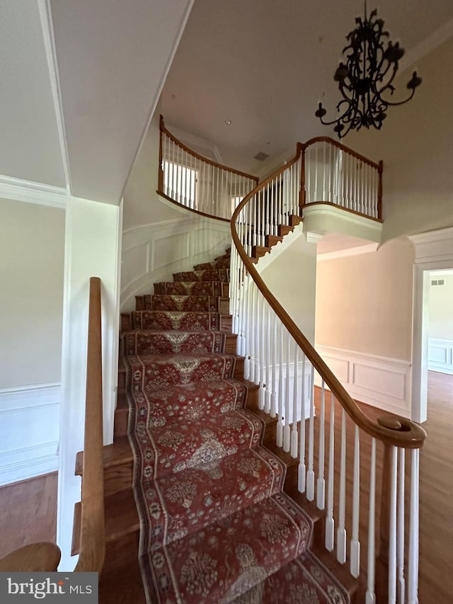 staircase featuring hardwood / wood-style floors