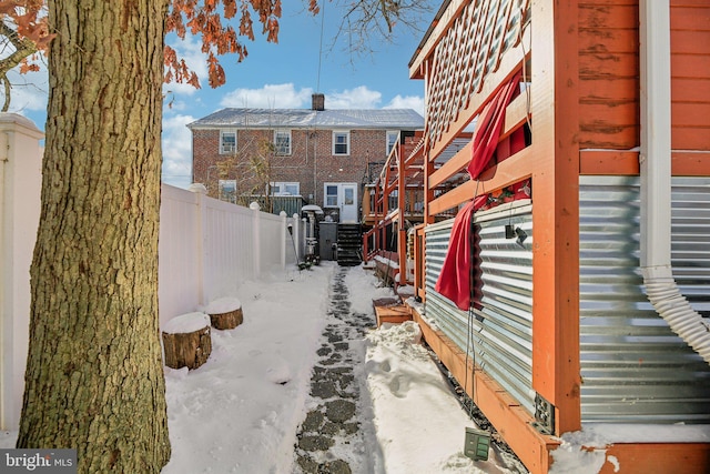 view of snow covered property