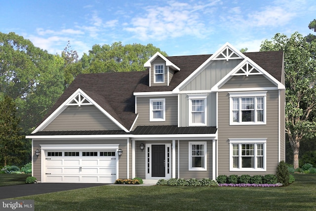 view of front facade featuring a front yard and a garage