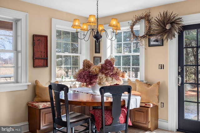 dining room featuring a notable chandelier