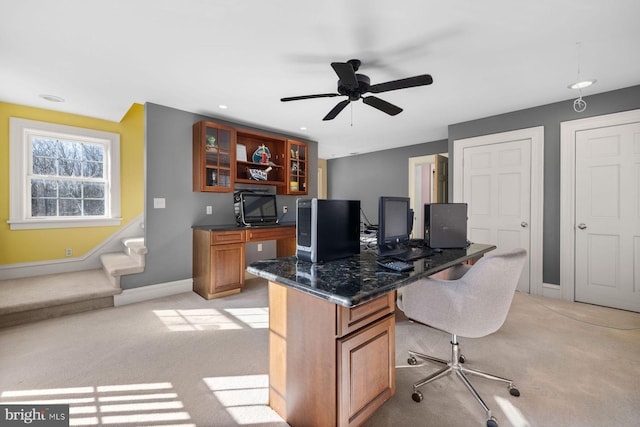 office featuring light colored carpet and ceiling fan