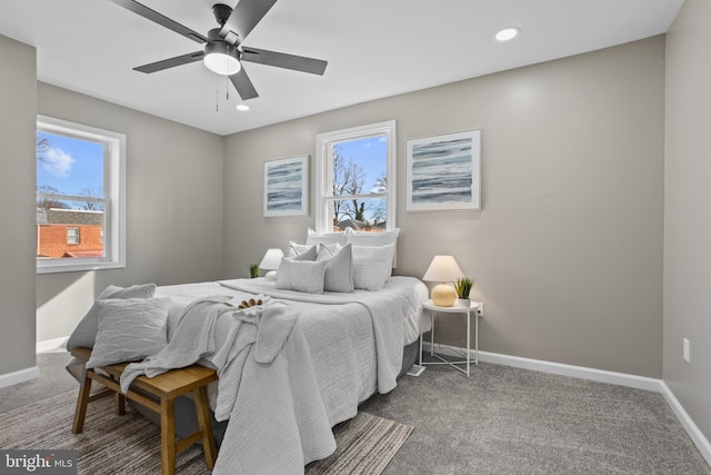 carpeted bedroom featuring ceiling fan