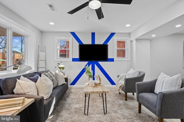 living room with ceiling fan