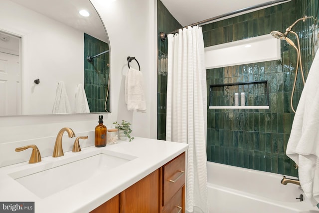 bathroom featuring shower / bath combination with curtain and vanity