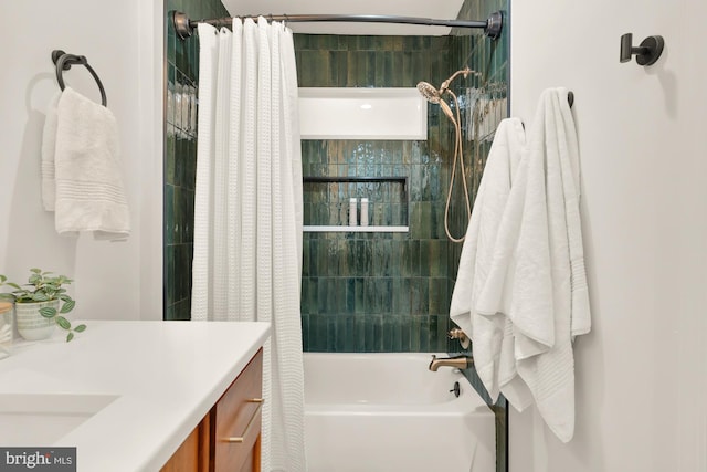 bathroom featuring shower / bath combination with curtain and vanity