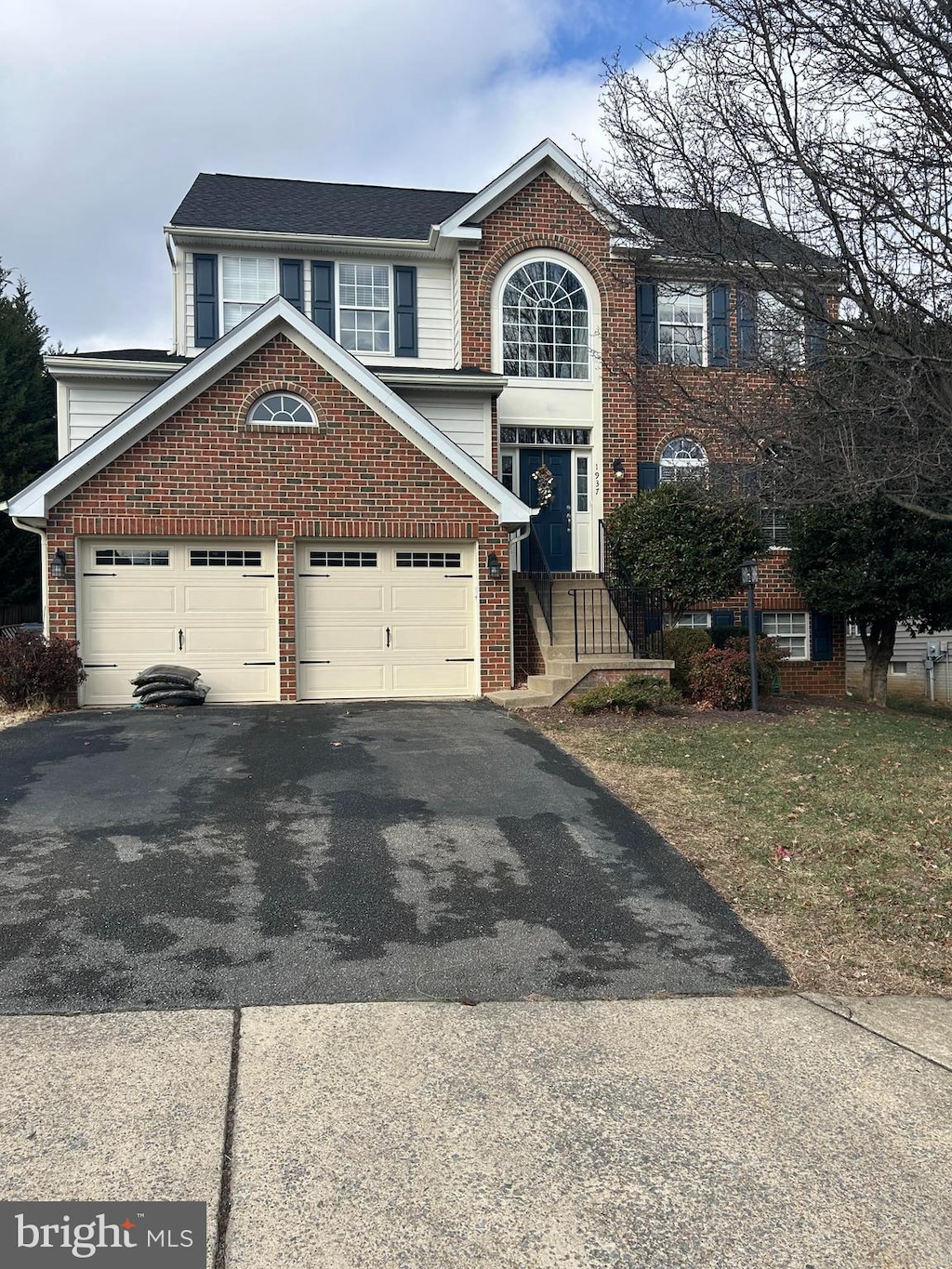 front of property with a garage